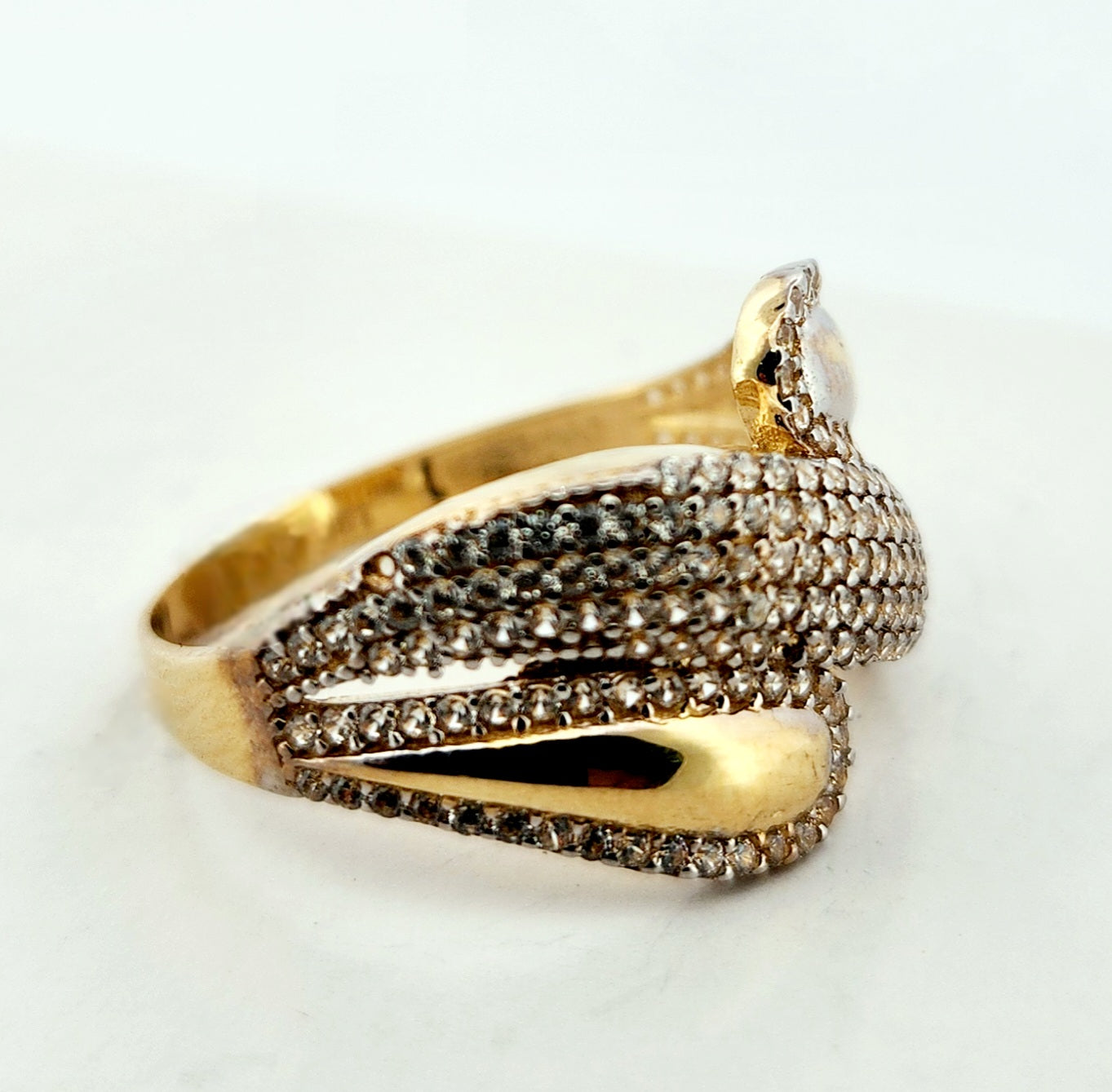 WOMAN'S 18k stones wave line with lateral drops/zircon stones