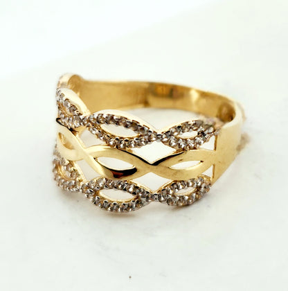 WOMAN'S 18k 3 wavy Bands/zircon stones