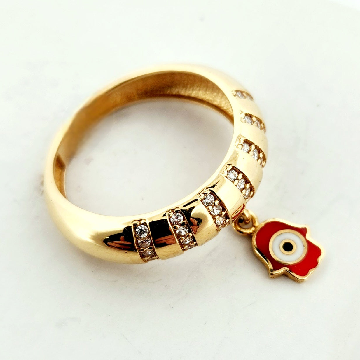 WOMAN'S 18K red hanging eye design ring/zircon stones