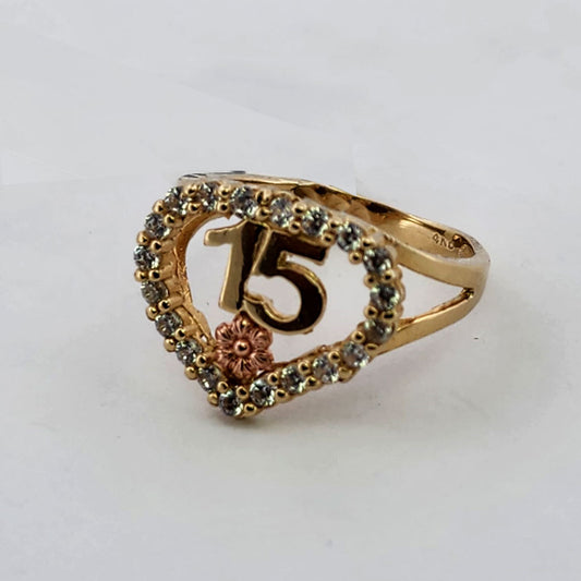 14K YELLOW GOLD SWEET FIFTEEN RING WITH/ZIRCONIUMS.